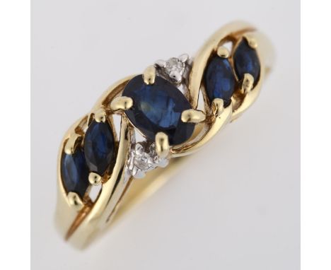 A modern 9ct gold sapphire and diamond dress ring, setting height 7.2mm, size N, 2.7gNo damage or repairs, all stones present