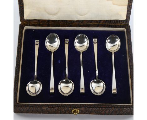 A set of 6 Arts and Crafts George V silver coffee spoons, by Hukin & Heath, designed by Christopher Dresser, hallmarks Birmin