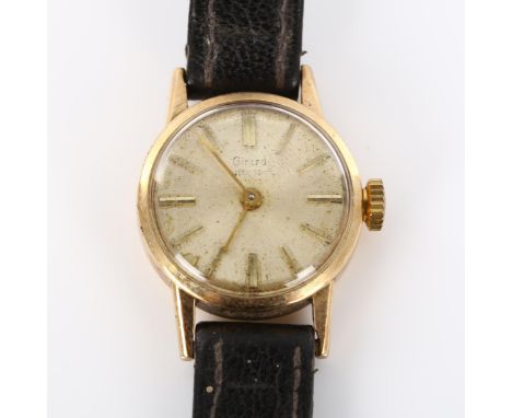 GIRARD PERREGAUX - a lady's 9ct gold mechanical wristwatch, silvered dial with gilt baton hour markers, 17 jewel movement, se