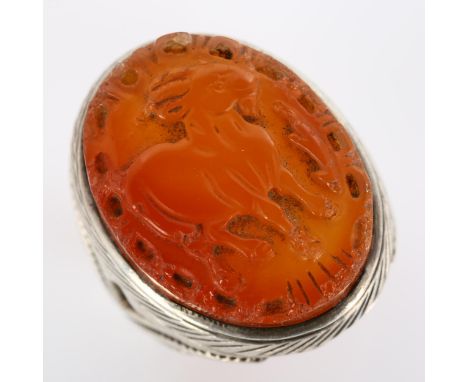 A large Eastern silver carnelian Sagittarius cameo ring, setting height 33.2mm, size Z+, 27.1gNo damage or repairs, only gene
