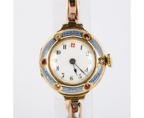 An early 20th century lady's 18ct gold mechanical bracelet watch, white enamel dial with hand painted Arabic numerals, blued 