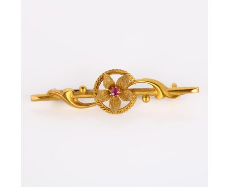 An early 20th century 15ct gold ruby flowerhead bar brooch, maker's marks FB, hallmarks Chester 1907, brooch length 44.3mm, 2