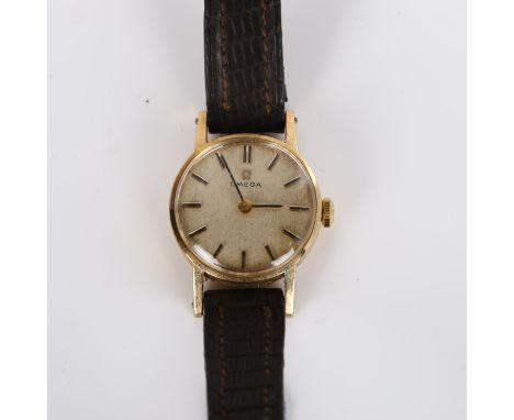 OMEGA - a lady's 9ct gold mechanical wristwatch, silvered dial with baton hour markers, case width 24mm, working orderMovemen