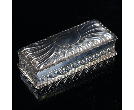 A late Victorian silver dressing table jewel box, rectangular form with fluted decoration and crimped rim, by William Comyns,