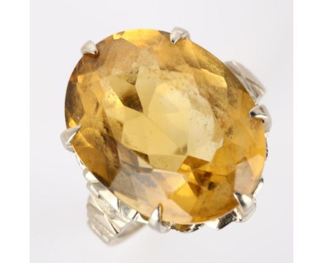 An American 9ct white gold citrine dress ring, by Birks, setting height 19.7mm, size L, 6.7gNo damage or repairs, citrine has