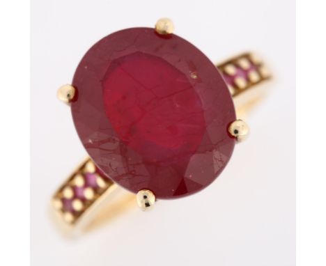 A modern 9ct gold ruby dress ring, with ruby shoulders, ruby length 13.2mm, size N, 4.5gNo damage or repairs, all stones pres