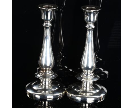 A pair of Thai silver table candlesticks, baluster form with stepped circular base, stamped Thailand silver 925, height 20.5c