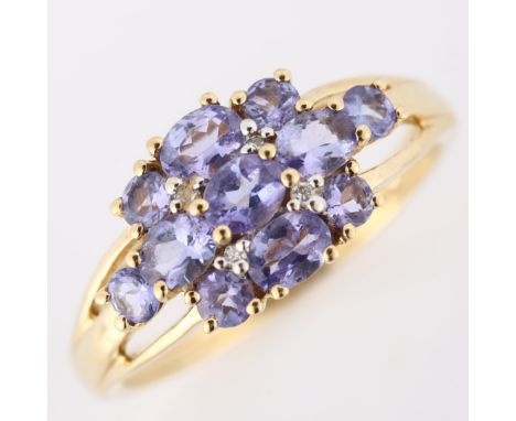 A modern 9ct gold tanzanite dress ring, set with oval mixed-cut tanzanite, setting height 9.4mm, size O, 2.5gNo damage or rep