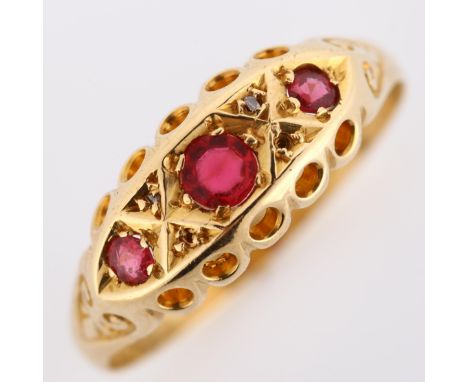 An early 20th century 18ct gold ruby and diamond half hoop ring, maker's marks W & FR, hallmarks Birmingham 1919, setting hei