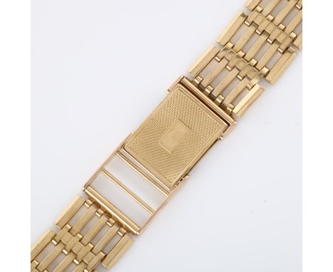 A 9ct gold gatelink watch bracelet, with engine turned clasp and 2 spare links, maker's marks JAM, hallmarks Birmingham 1976,