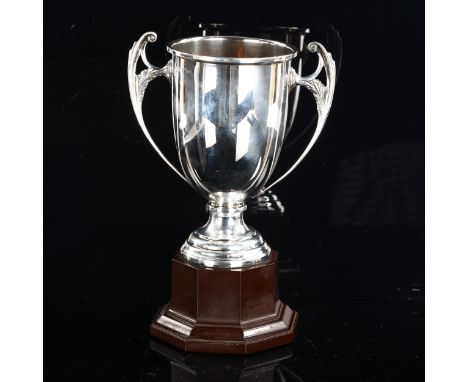 A George VI silver 2-handled trophy cup, on Bakelite base, by William Neale & Sons Ltd, hallmarks Birmingham 1937, overall he