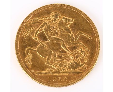 A George V 1913 gold full sovereign coin, 7.9gHigh points slightly worn with light abrasions all over and a few tiny indents 