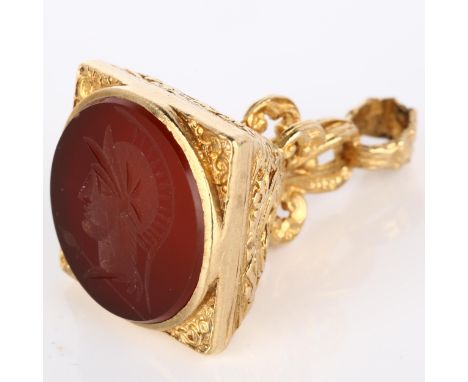 A mid-20th century 9ct gold carnelian seal fob, intaglio carved depicting head of Centurion, in pierced gold mount, seal diam