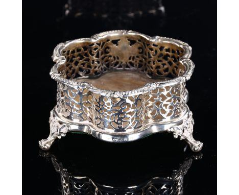 A Victorian silver-mounted oak wine bottle coaster, lobed form with relief embossed beaded edge, pierced floral gallery and l