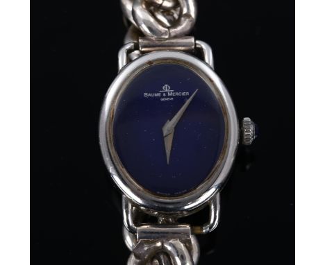BAUME & MERCIER - a lady's silver mechanical bracelet watch, ref. 1800, oval blue dial with cabochon crown and unmarked silve
