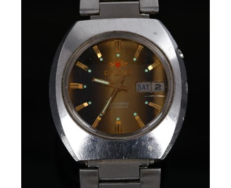 ORIENT - a Vintage stainless steel automatic bracelet watch, circa 1970s, tigers eye dial with baton hour markers, sweep cent