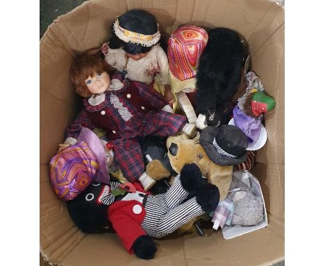 Quantity of soft toys and dolls including a clown with ceramic face, porcelain headed collectors dolls, etc