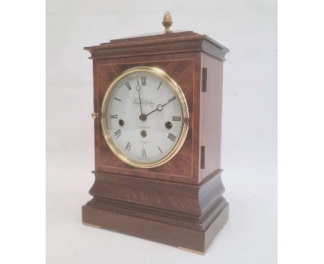 Kieninger reproduction mahogany bracket clock retaileded by Knight & Gibbins, of Georgian style, having stepped pediment surm