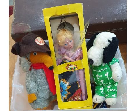 Pelham puppet of Cinderella, in box, a Pedigree Womble soft toy, a Snoopy soft toy and accessories 