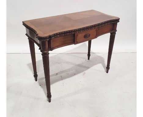 Early 20th century mahogany card table, the serpentine front fluted and supported to peg feet