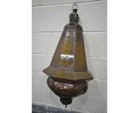 A MORROCAN LANTERN, with yellow etched glass panels, drop height 83cm