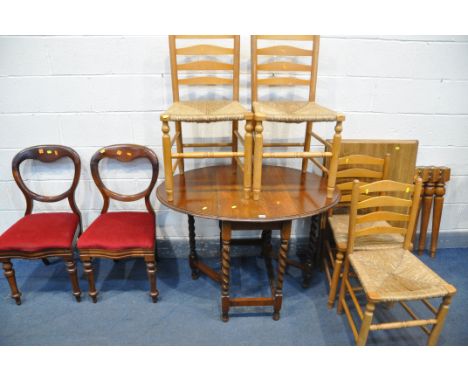 A DISMANTLED OAK TABLE (missing nuts for the legs) a 20th century oak gate leg table, with barley twist supports, open length
