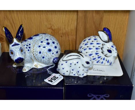 THREE BOXED ROYAL CROWN DERBY PAPERWEIGHTS, comprising English Rabbit, Blue, and 25th Anniversary Rabbits: Platinum Rabbit an