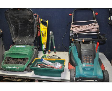 A BOSCH ROTAK 40 LAWN MOWER with grass box along with a Qualcast lawnraker32 with grass box and a small box of tools and gard