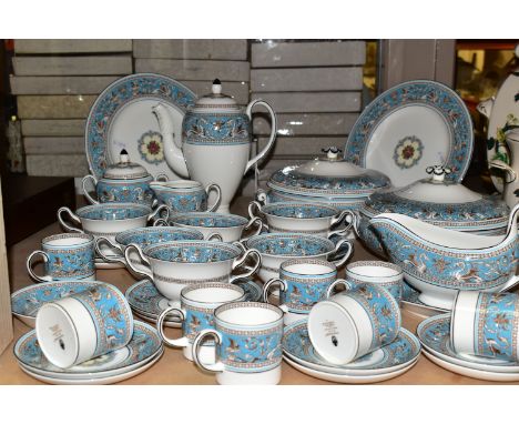 A THIRTY SIX PIECE WEDGWOOD TURQUOISE FLORENTINE W2714 PART DINNER SERVICE, comprising two tureens, a sauceboat and stand, a 