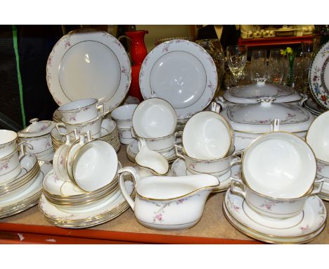 A SEVENTY PIECE WEDGWOOD 'CARISROOKE' PATTERN DINNER SERVICE, comprising two covered tureens, eight dinner plates, eight side