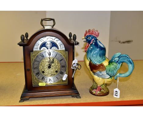 A  HERMLE MOON PHASE MANTEL CLOCK TOGETHER WITH A GEORGES DREYFUS FAIENCE COCKEREL JUG, the jug is stamped G.D Paris  Deposé 