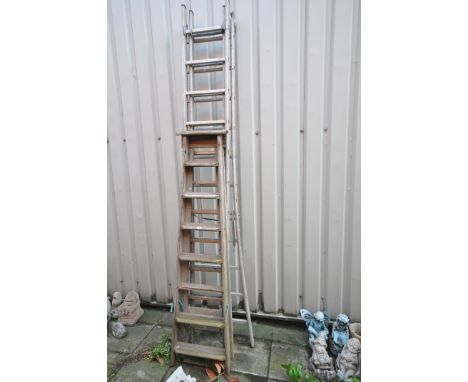 AN ALUMINIUM TRIPLE EXTENTION LADDER, and a wooden step leader (2)