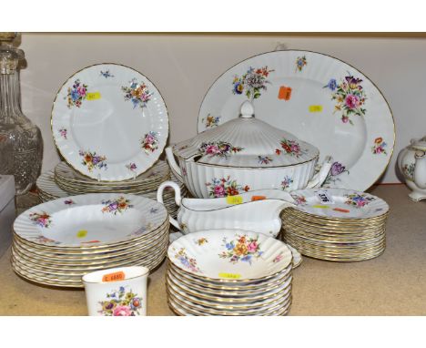 A ROYAL WORCESTER 'ROANOKE' PATTERN DINNER SERVICE, comprising a circular covered soup tureen, one meat plate, a gravy jug wi