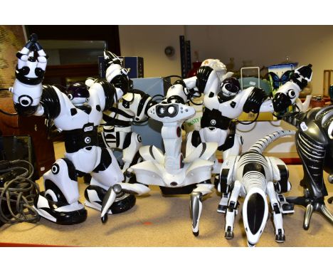 A COLLECTION OF WOWEE ANIMATRONIC ROBORAPTORS AND HUMANOIDE ROBOSAPIENS, comprising six 32   Wowee Roboraptors of varying age