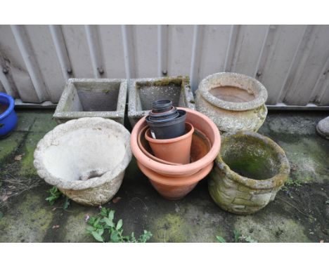 A PAIR OF WEATHERED SQUARE TAPERED COMPOSITE PLANTERS, 36cm squared x height 33cm, three various other planters, a terracotta