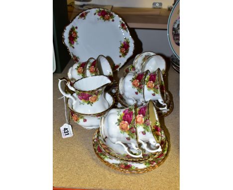 A ROYAL ALBERT 'OLD COUNTRY ROSES' PATTERN TEA SET, comprising eight tea cups, eight saucers, one milk jug, sugar bowl, bread