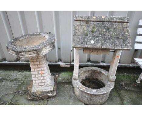 A WEATHERED COMPOSITE WISHING WELL PLANTER, and an octagonal bird bath on a separate brick effect base (condition:-repair to 