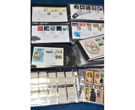 THREE COLLECTORS ALBUMS CONTAINING CIGARETTE CARDS AND FIRST DAY COVERS STAMPS, cigarette cards include Westminster tobacco C