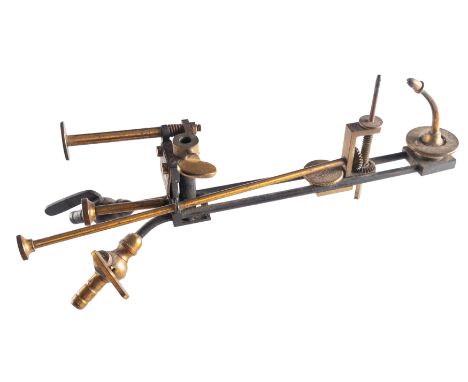 A lacquered brass 'Improved Oxy-Hydrogen Lime Light Illuminant' , maker Kersham, with plaque as per title, 29cm long 