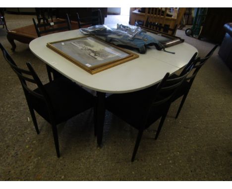 RETRO WHITE MELAMINE TOP EXTENDING DINING TABLE WITH A SET OF SIX EBONISED LADDER BACK DINING CHAIRS 