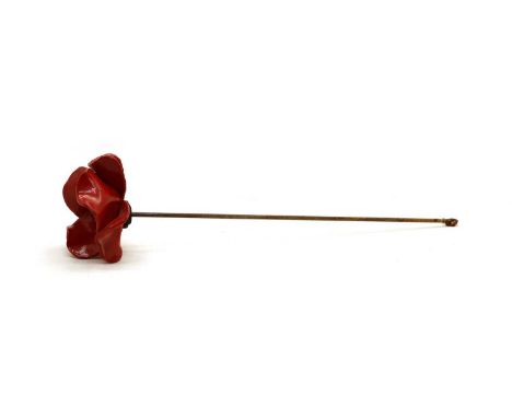 Paul Cummins and Tom Piper, an original ceramic poppy, from the art installation 'Blood Swept Lands And Seas Of Red' shown at