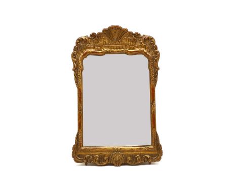 Two Georgian style giltwood wall mirrors, early 20th century, the first with shell decoration and spurious date. 57cm wide, 1