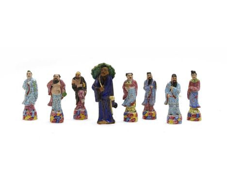 A collection of Chinese famille rose figures, of eight Daoist Immortals, and two Shaolao, 5 to 10cm high, two figures in blue