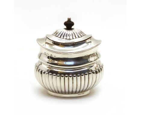 A Victorian silver tea caddy, Nathan &amp; Hayes, Birmingham 1894, of oval shape with all-over gadrooned detail, the hinged l