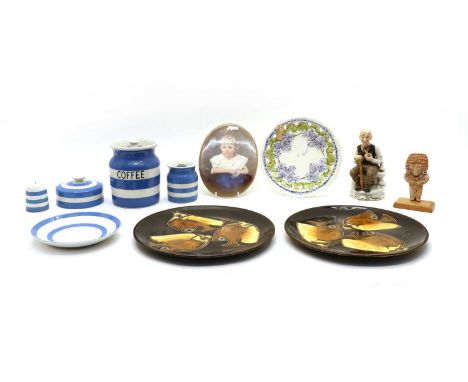 A collection of Cornishware pottery, comprising: a large coffee storage jar, 14.2cm high, five small, 8.7cm high, two peppers