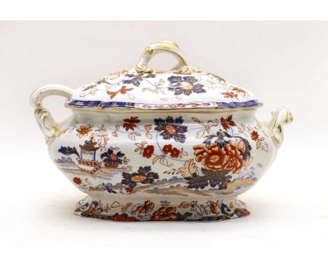 A Victorian tureen, cover and ladle, marked Amherst Japan No 62 Stone China, 36cm wide, together with a large Ironstone meat 