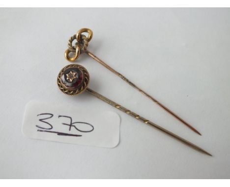 Two gold stick pins 