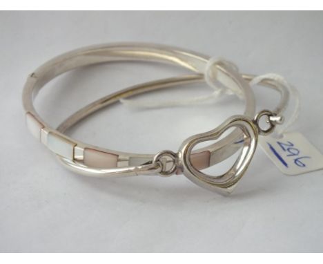 Two silver bangle inc heart motif