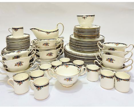 A ninety six piece Wedgwood "Osborne"pattern bone china part dinner service, including a sugar bowl, gravy boat and flat, twe