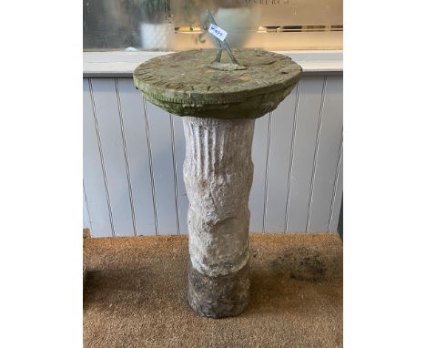 A 19th century carved sandstone sundial, the circular top with copper pointer standing on a cylindrical fluted column, H93cm 